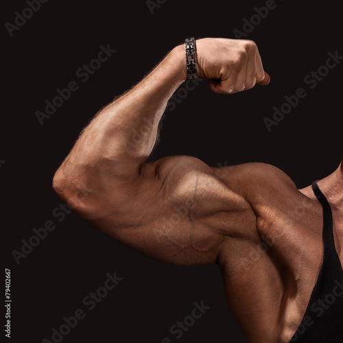 Close up of man's arm showing biceps photo