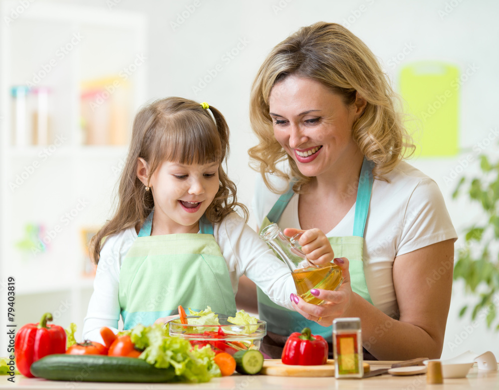 mother and kid preparing healthy food