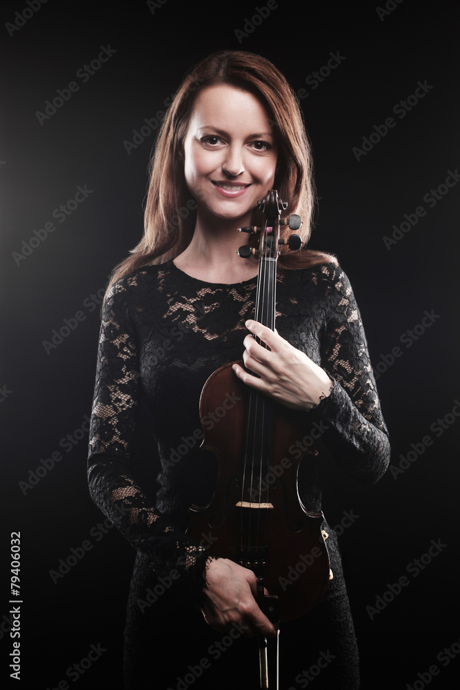 Beautiful woman portrait with violin
