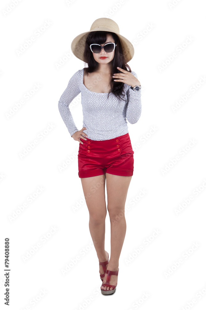 Fashionable woman with hat in studio Fashionable woman with hat in studio