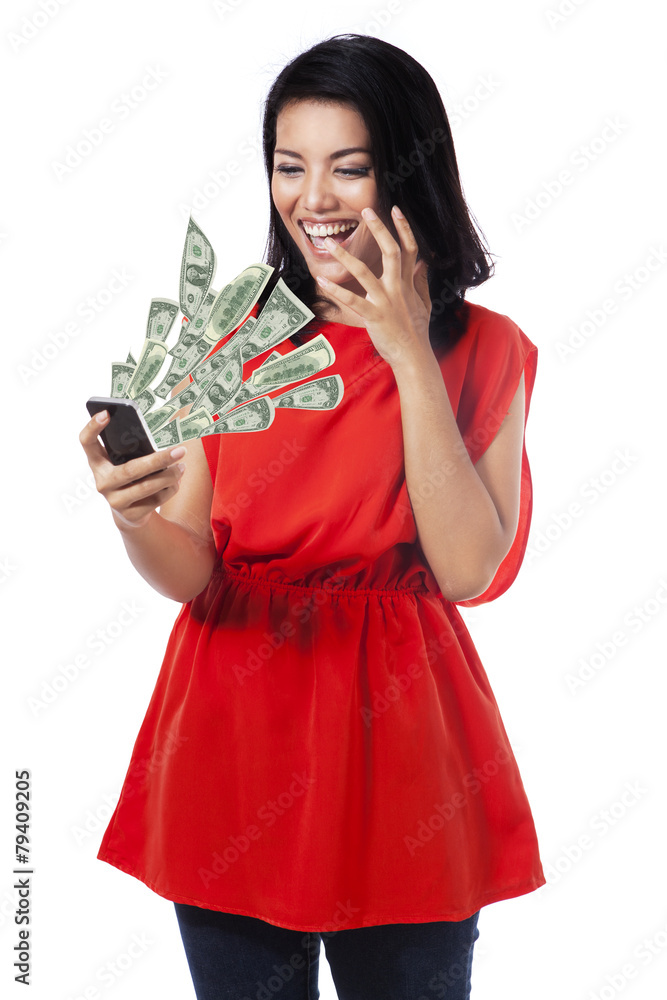 Happy woman with money from cellphone Happy woman with money from cellphone