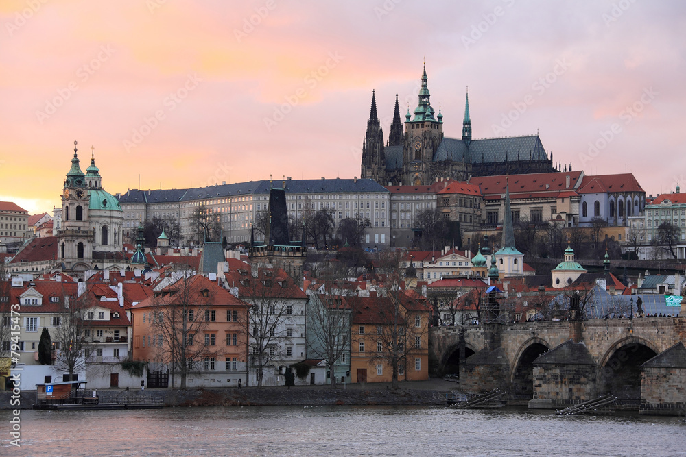 Prague gothic Castle with Charles Bridge after sunset