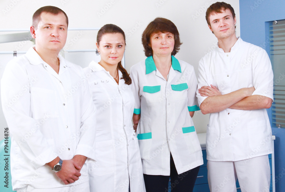 Medical doctors standing in office Medical doctors standing in office
