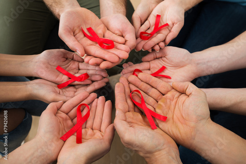 Фотография People Holding Aids Ribbon