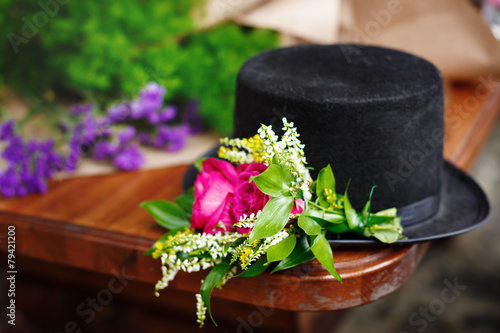 Black hat with flower decoration
