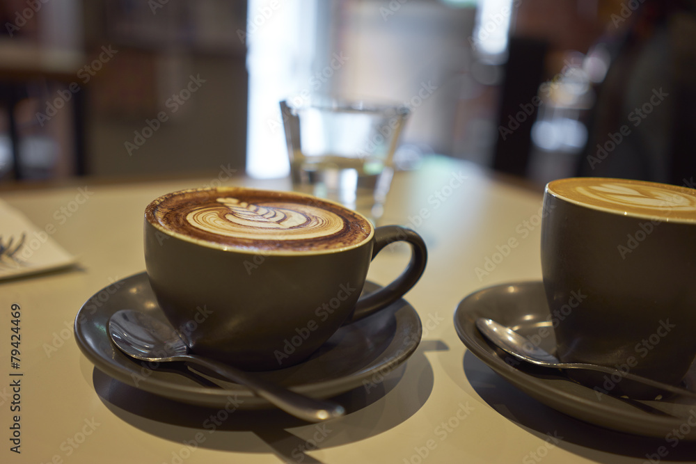 Fototapeta premium cups of coffee on table