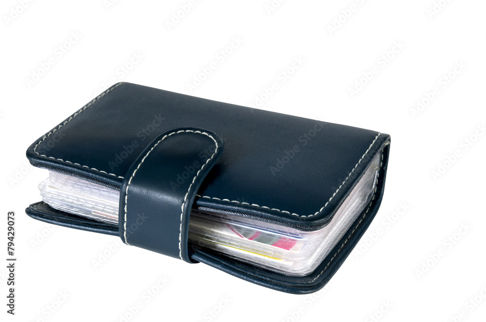 The darkly blue leather wallet with credit cards inside The darkly blue leather wallet with credit cards inside