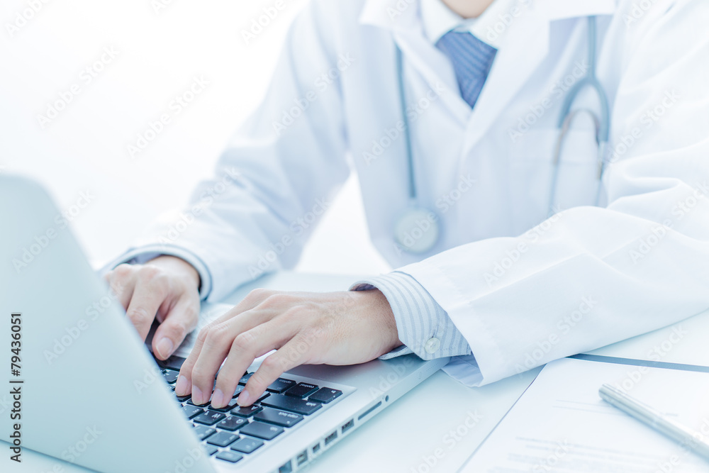 Close-up of a medical worker with laptop Close-up of a medical worker with laptop