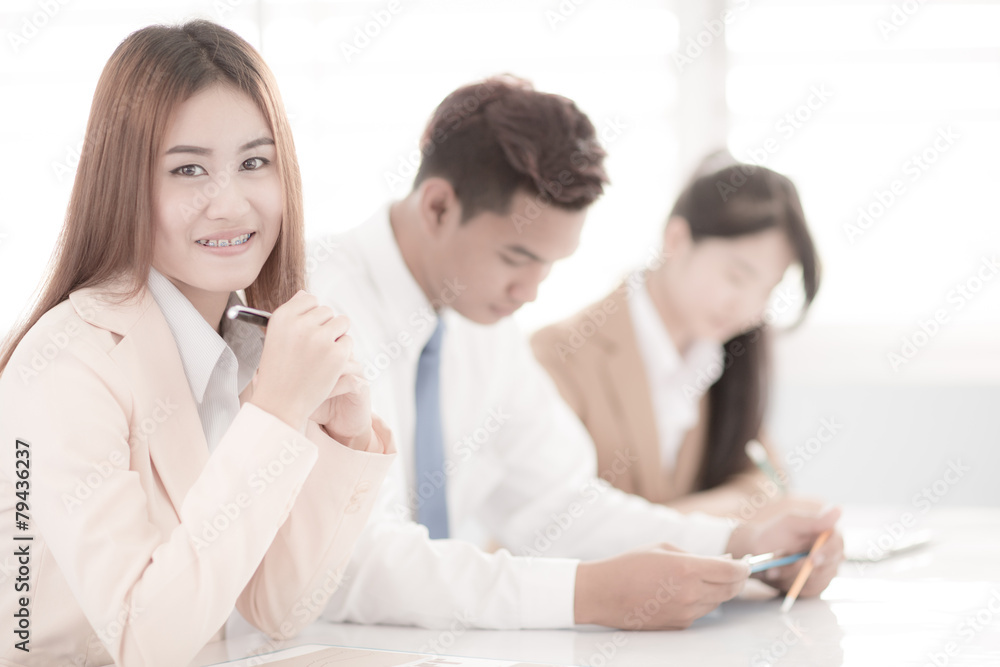 Business people discussing the charts and graphs showing the res Business people discussing the charts and graphs showing the res