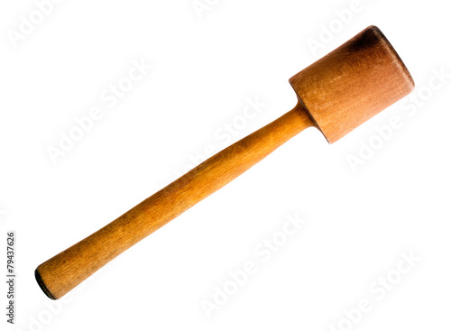 Old wooden pestle on white background.