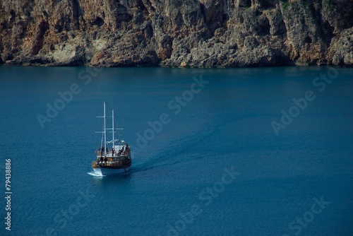 View of Antalya's coastline with tourist ship