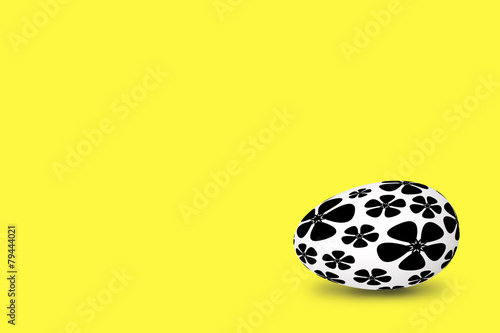 black-and-white easter egg decorated with ornament