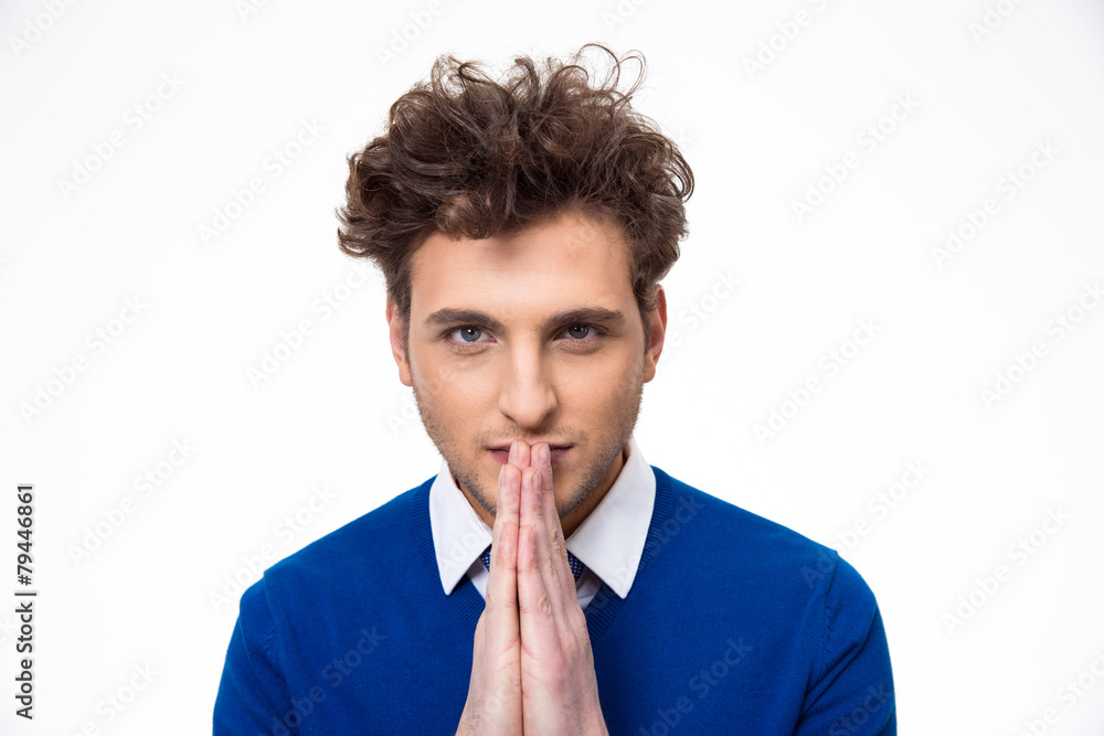 Thoughtful man with curly hair isolated on a white background Thoughtful man with curly hair isolated on a white background