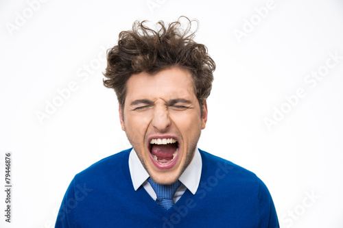 Portrait of man shouting over white background
