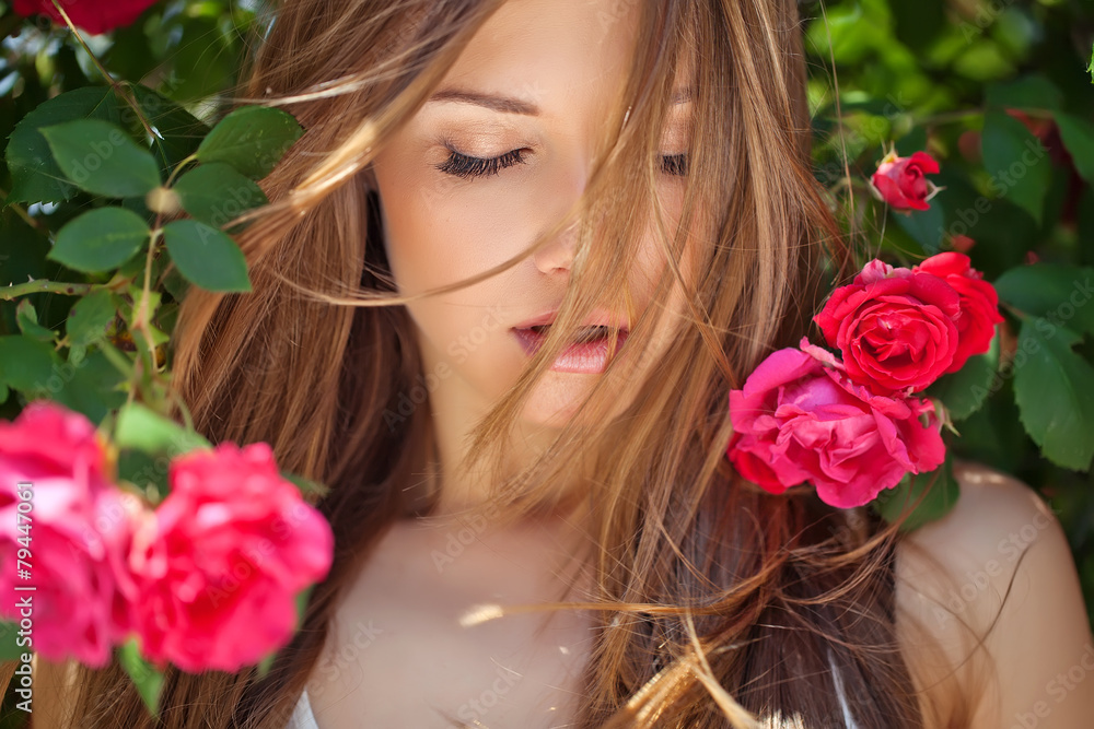 Fototapeta premium beautiful woman in pink flowers