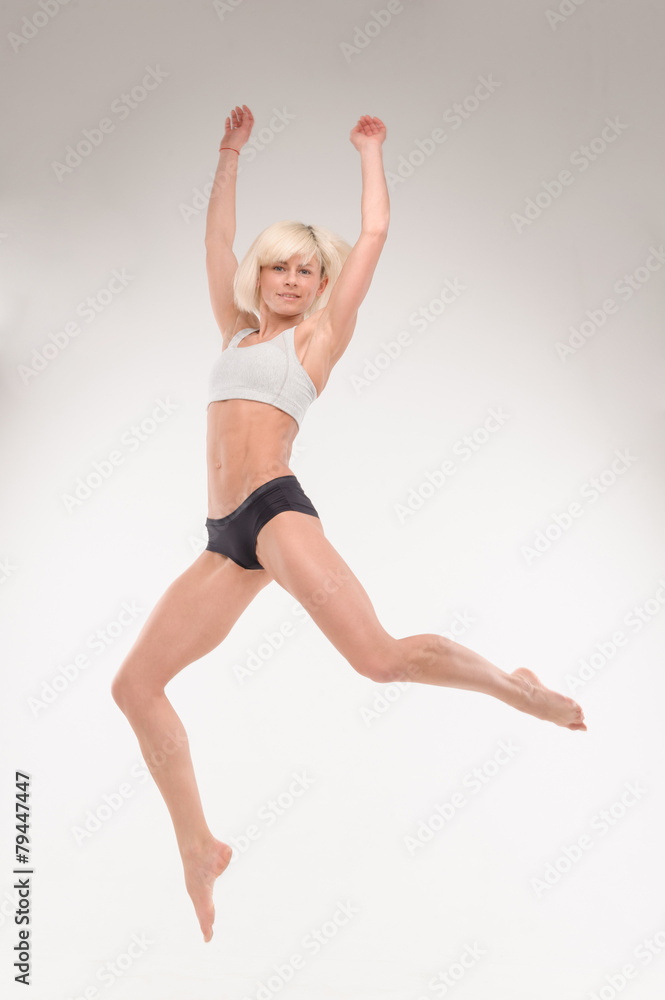 beautiful young blonde in a jump