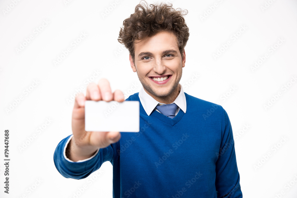 Cheerful businessman showing blank business card Cheerful businessman showing blank business card