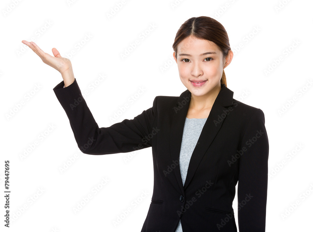 Young businesswoman with hand show with something Young businesswoman with hand show with something