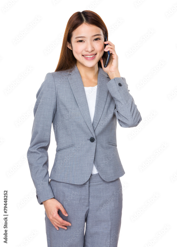 Asian businessswoman talk to cellphone Asian businessswoman talk to cellphone