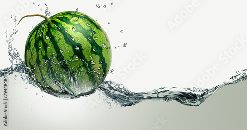 Fotografija Watermelon ripe amid splashing water.