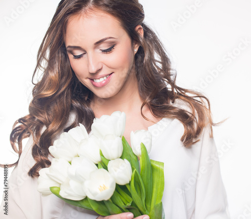 Woman with pulip flowers photo