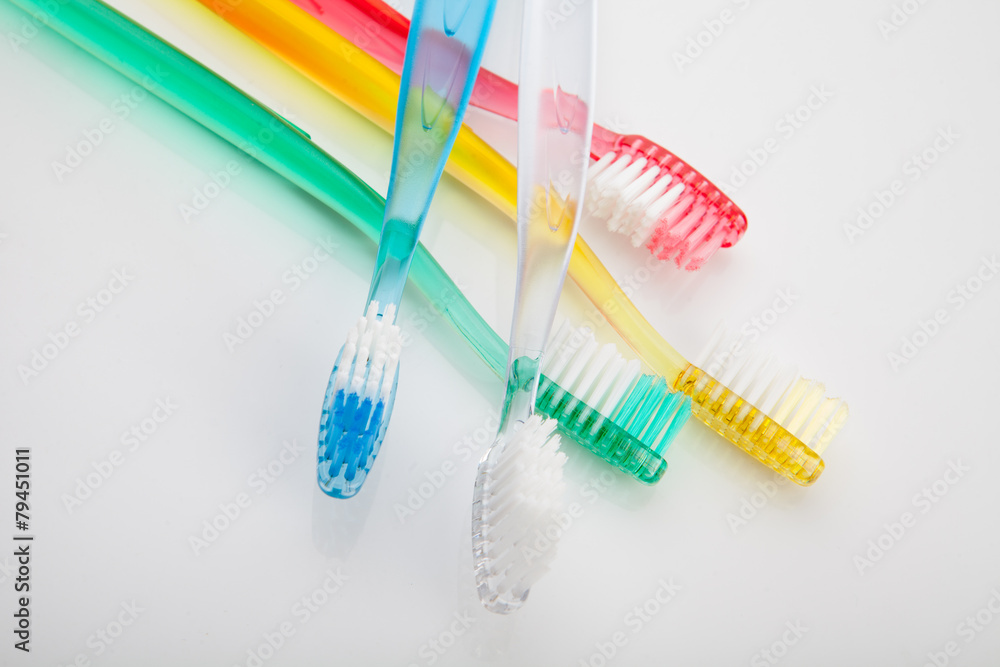 tooth brush, tooth paste in glass on white background tooth brush, tooth paste in glass on white background