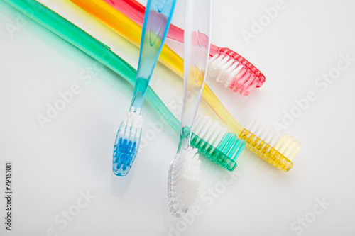 tooth brush  tooth paste  in glass  on white background