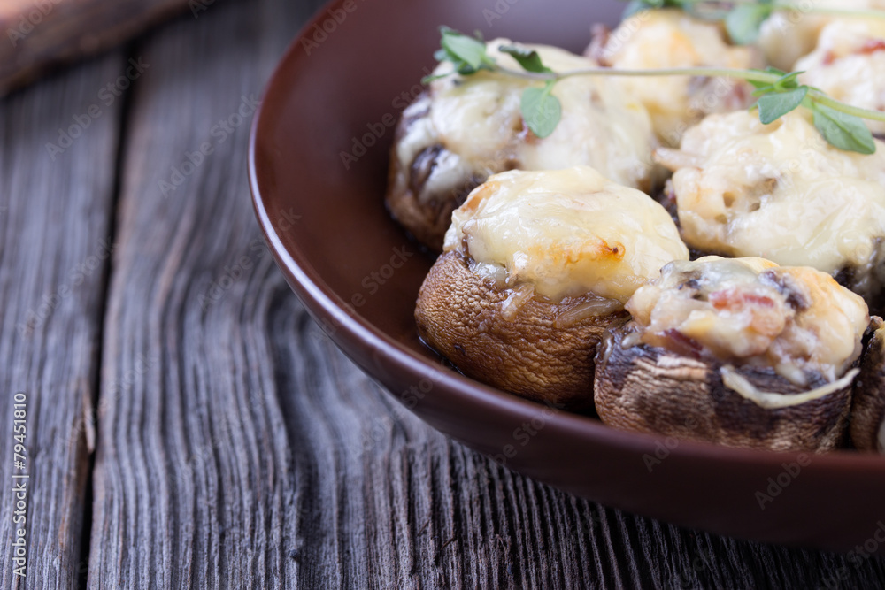 Delicious stuffed mushrooms with meat and cheese.
