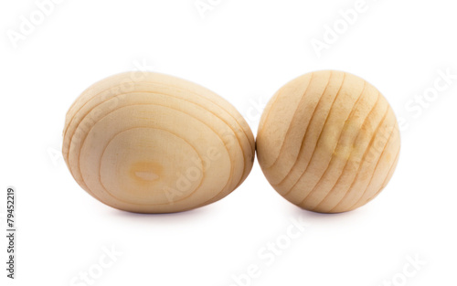 two wooden eggs isolated on white background