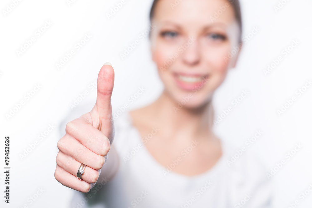 Woman showing thumb Woman showing thumb