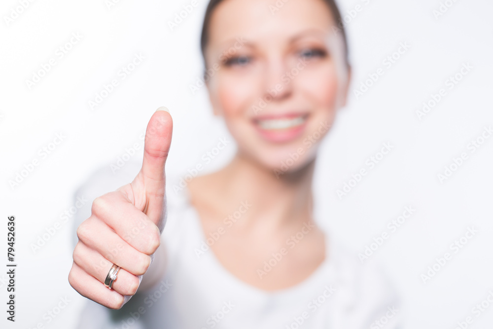 Woman showing thumb Woman showing thumb
