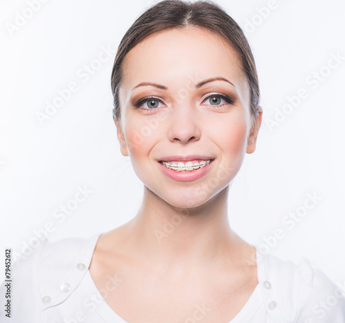 Tableau sur toile Woman with teeth braces