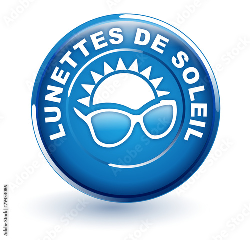 lunettes de soleil sur bouton bleu
