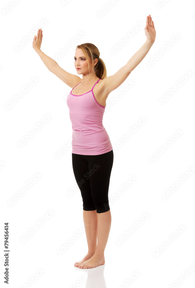 Young woman doing aerobic exercise. Young woman doing aerobic exercise.