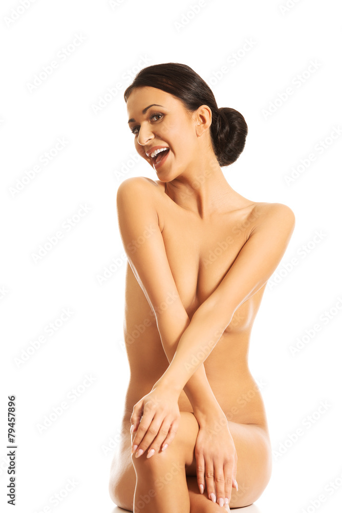 Obraz premium Slim spa woman sitting on the desk