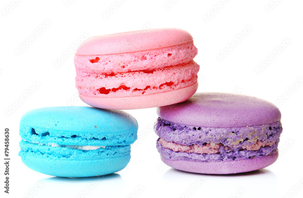 Tasty colorful macaroons isolated on white Tasty colorful macaroons isolated on white