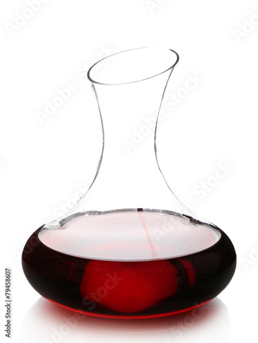 Glass carafe of red wine isolated on white