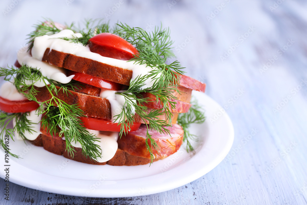 Sandwich with sausage, tomato and mayonnaise Sandwich with sausage, tomato and mayonnaise