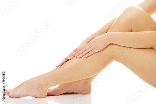 Spa woman sensual touching her leg.