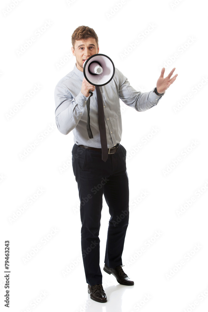 Fototapeta premium Businessman shouting through megaphone.