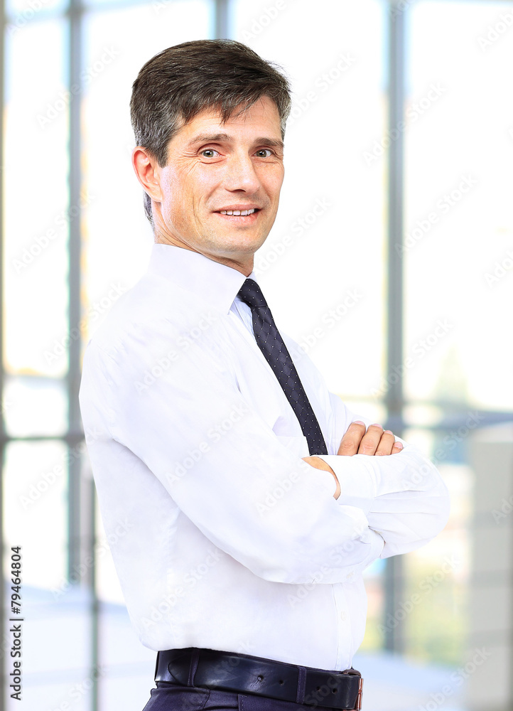Portrait of a happy senior business man smiling Portrait of a happy senior business man smiling