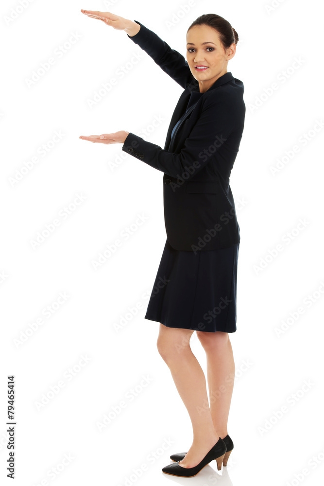 Businesswoman holding copy space in hands. Businesswoman holding copy space in hands.
