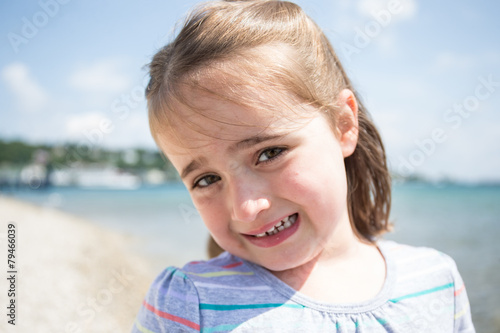kid on beach girl cute smile young child © Paul Retherford