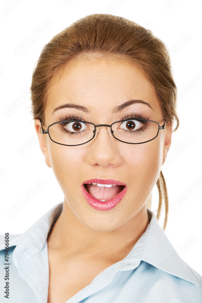 Young businesswoman with shock expression. Young businesswoman with shock expression.