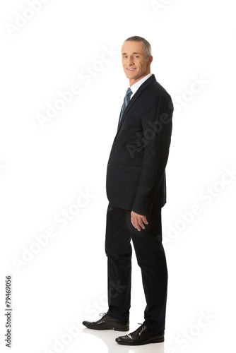 Businessman with hand in pocket