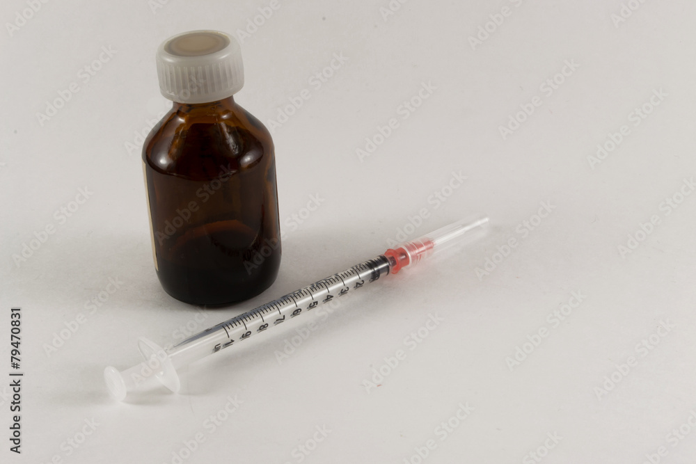 Medicine and Hypodermic Syringe. Medicine and Hypodermic Syringe.