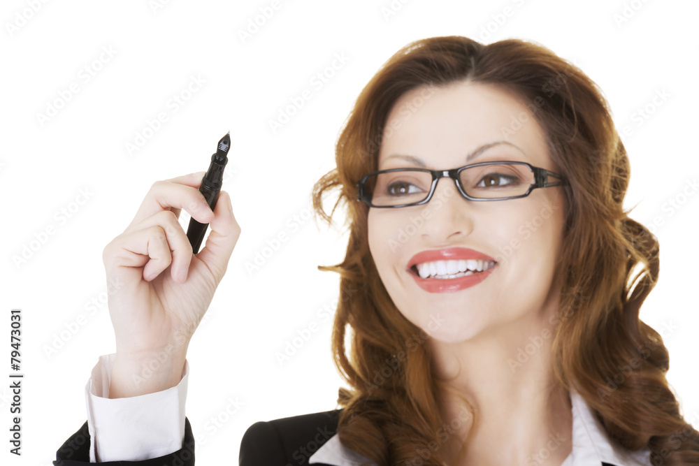 Businesswoman writing with pen on abstract screen. Businesswoman writing with pen on abstract screen.