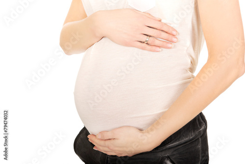 Pregnant woman holding her belly © Piotr Marcinski