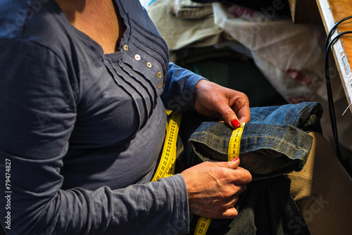 Middle aged woman sewing