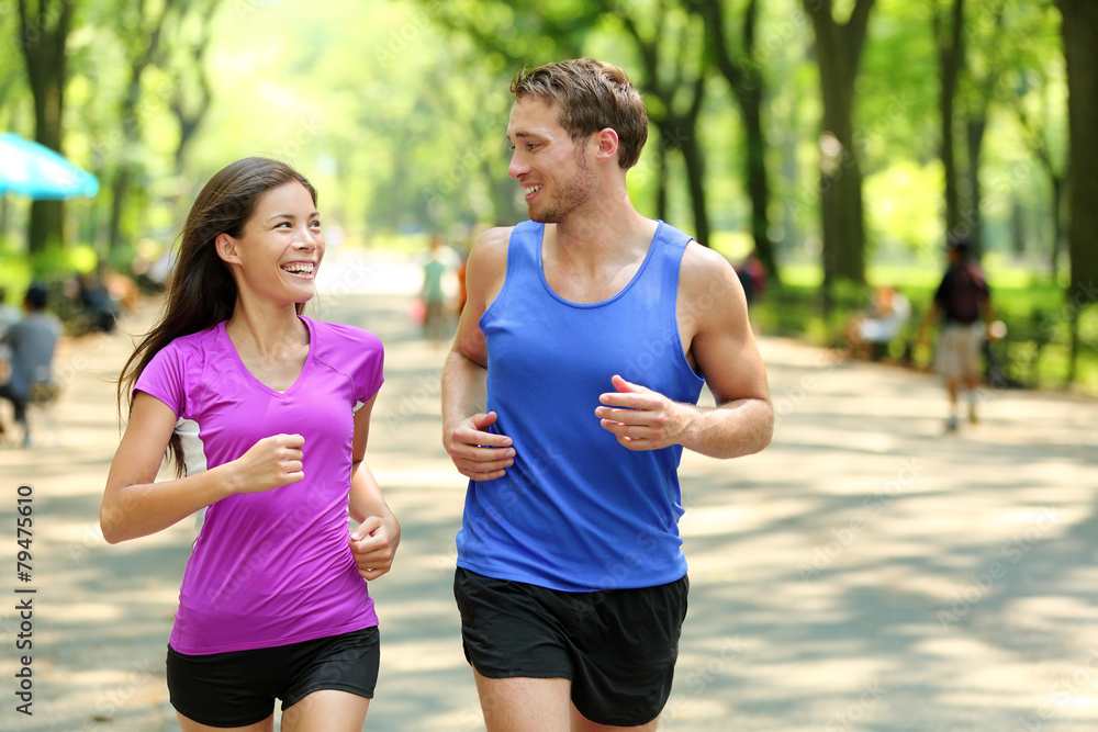 Running couple training in Central Park, New York